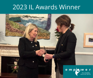 Photo of her Honour the Lieutenant Governor of Newfoundland Labrador, the Honourable Joan Marie Aylward with award winner Katherine Peddle, shaking hands. Title reads 2023 IL Awards Winner. The Empower logo is in the lower right corner. 