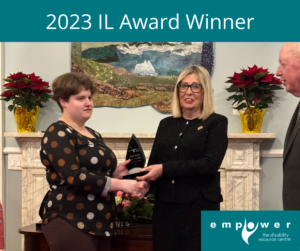 Photo of her Honour the Lieutenant Governor of Newfoundland Labrador, the Honourable Joan Marie Aylward with award winner Kayla Warren, shaking hands. Title reads 2023 IL Awards Winner. The Empower logo is in the lower right corner. 