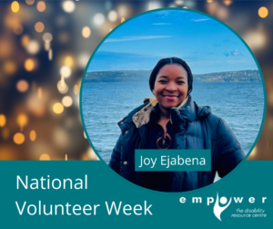 A photo of Joy Ejabena smiling in front of the ocean. There are white party lights behind. Title reads National Volunteer Week. The Empower logo is in the lower right corner.
