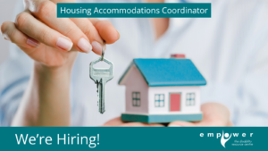 A person holds a tiny wooden house in one hand and a key dangles from the other hand. Text reads We're Hiring! Housing Accommodations Coordinator. The Empower N L logo is in the lower right corner.