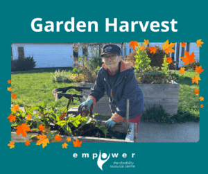 An Empower N L member harvests produce from an accessible garden bed. Title reads Garden Harvest. The Empower N L logo is centered at the bottom.